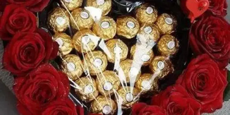 arrangement of roses and chocolates