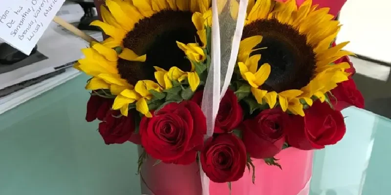 pink box of roses and flowers