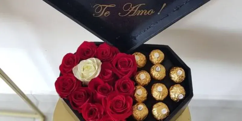 black box with 11 chocolates and roses