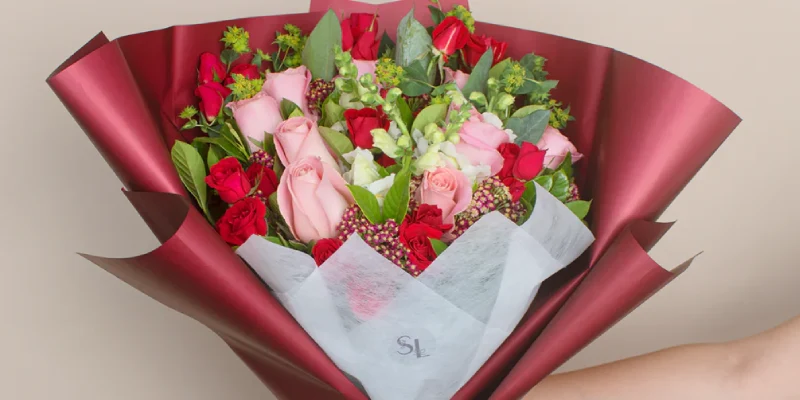 bouquet of red and pink spring roses