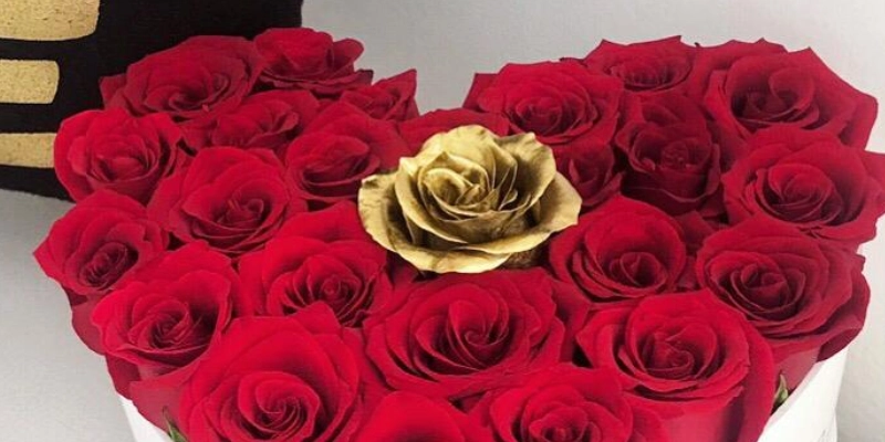 gold rose con rojas rojas